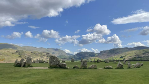 an ancient stone circle in the landscape