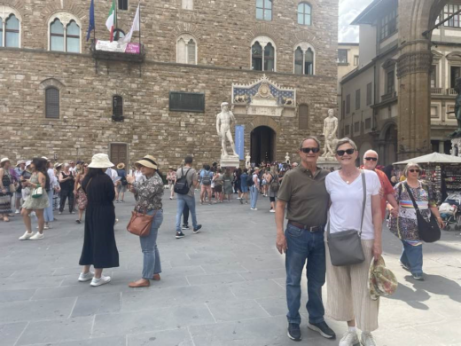 crowd in front of the Palazzo Vecchio in Florence, Italy